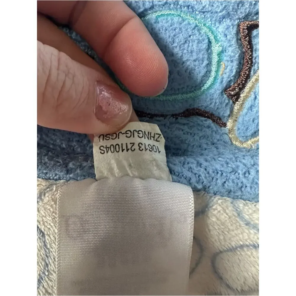 Taggies Blue Monkey Baby Blanket with Light Blue Dot Border